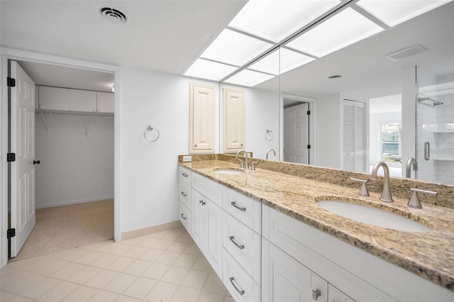 3021 Countryside Blvd Unit 28A, Clearwater, FL 33761 - bathroom featuring an enclosed shower and vanity