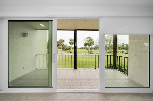 3021 Countryside Blvd Unit 28A, Clearwater, FL 33761 - doorway to outside with light tile patterned floors