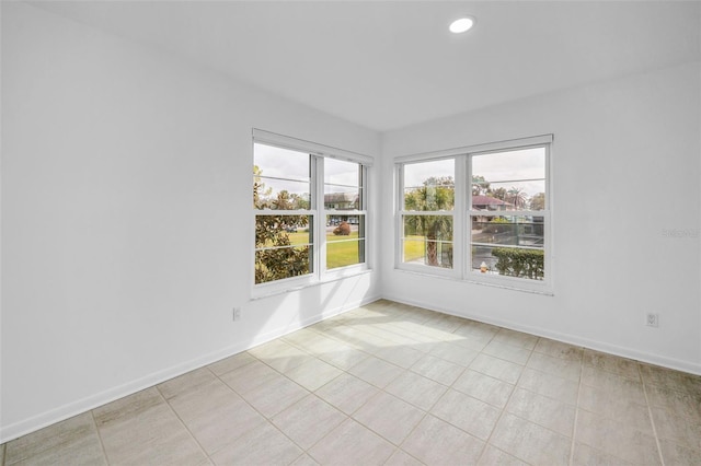 3021 Countryside Blvd Unit 28A, Clearwater, FL 33761 - unfurnished room with light tile patterned floors