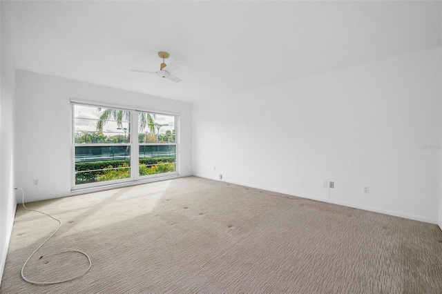 3021 Countryside Blvd Unit 28A, Clearwater, FL 33761 - carpeted empty room featuring ceiling fan
