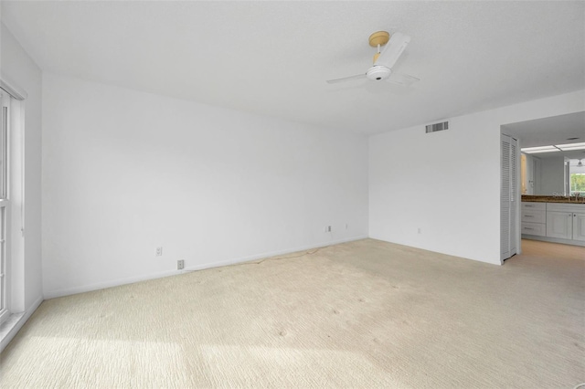 3021 Countryside Blvd Unit 28A, Clearwater, FL 33761 - carpeted spare room with ceiling fan