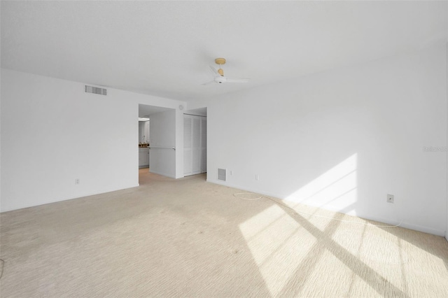 3021 Countryside Blvd Unit 28A, Clearwater, FL 33761 - carpeted empty room featuring ceiling fan