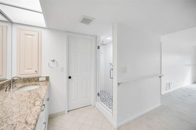 3021 Countryside Blvd Unit 28A, Clearwater, FL 33761 - bathroom featuring walk in shower and vanity