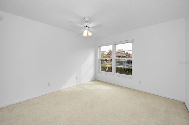 3021 Countryside Blvd Unit 28A, Clearwater, FL 33761 - spare room with ceiling fan and light colored carpet