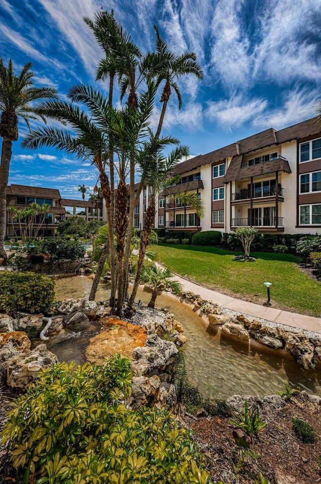 3021 Countryside Blvd Unit 28A, Clearwater, FL 33761 - view of community with a lawn