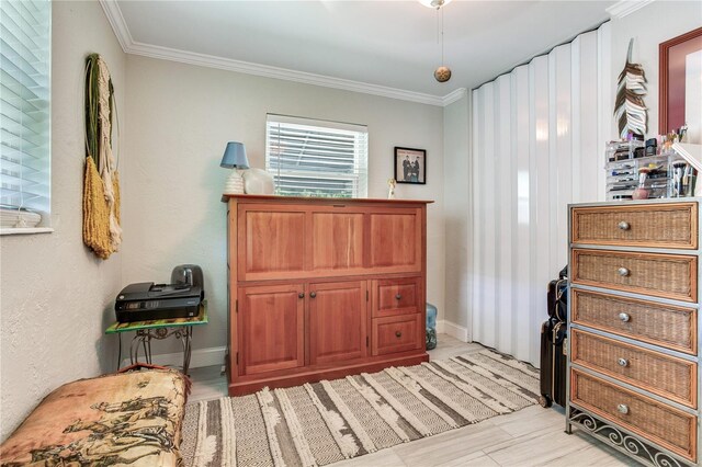 bedroom featuring crown molding