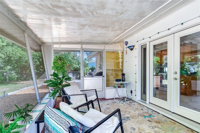 sunroom featuring french doors