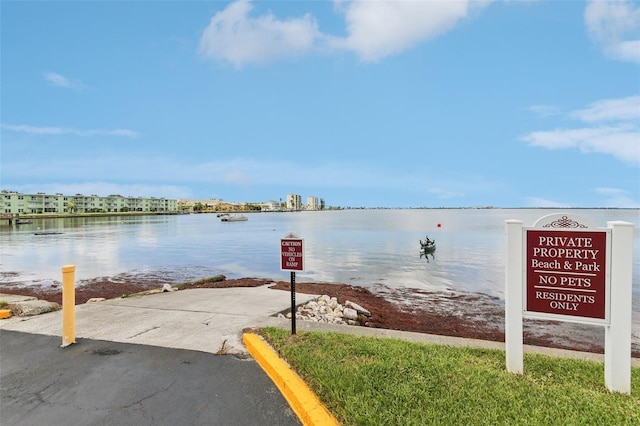 exterior space with a water view