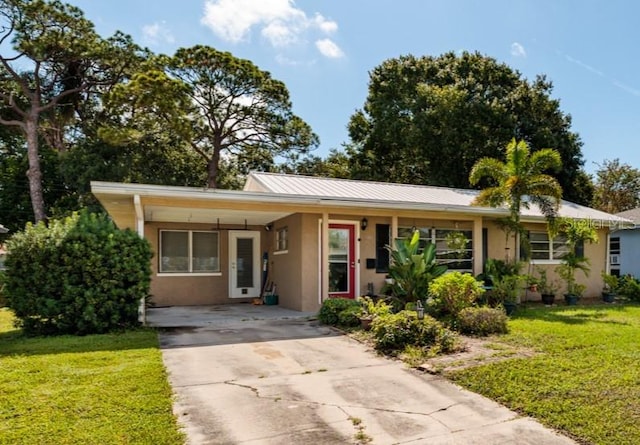 ranch-style home with a front yard and a porch