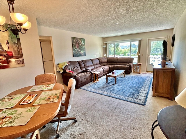 living room featuring a textured ceiling and light colored carpet