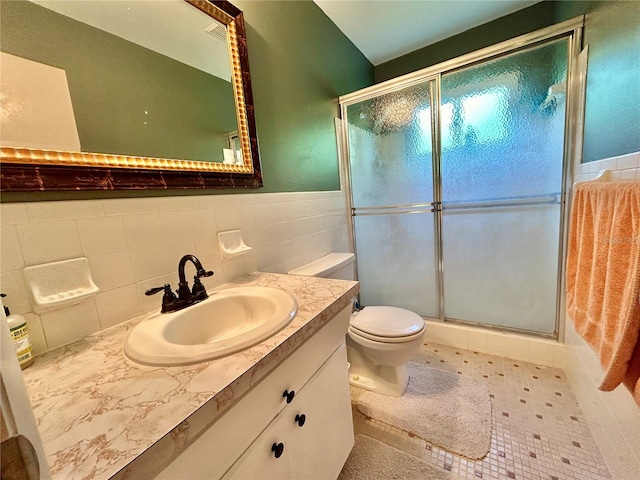 bathroom with walk in shower, toilet, decorative backsplash, and vanity