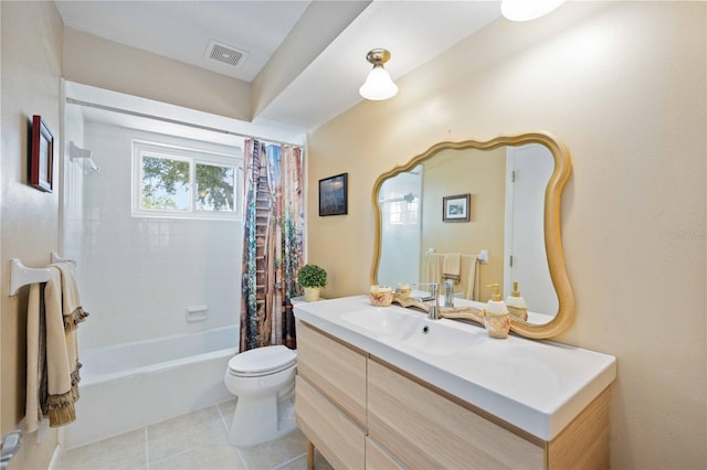 full bathroom featuring tile patterned floors, vanity, shower / bath combo, and toilet