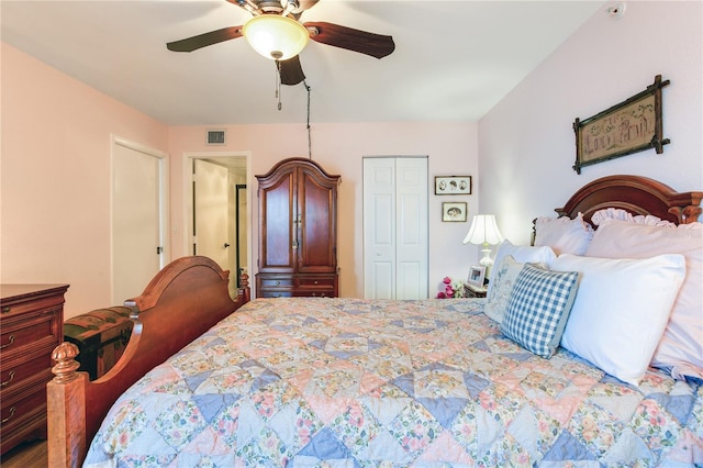 bedroom featuring ceiling fan and a closet