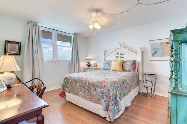 bedroom featuring light hardwood / wood-style flooring and ceiling fan