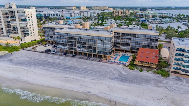 aerial view with a view of the beach and a water view