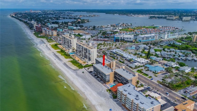 bird's eye view featuring a view of the beach and a water view