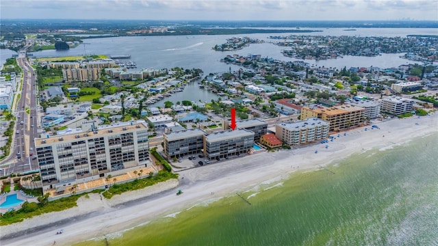 bird's eye view with a view of the beach and a water view