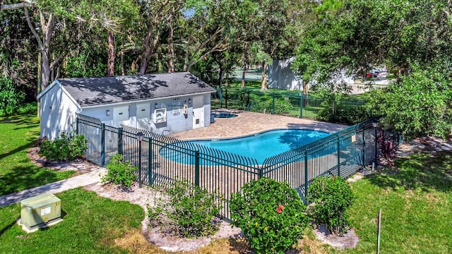 view of pool featuring a yard