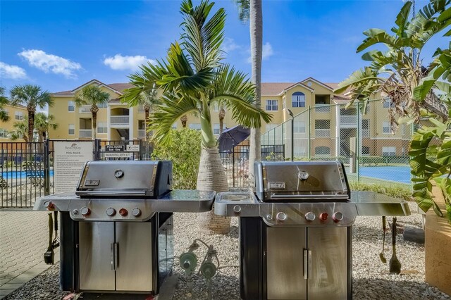 view of patio featuring a grill