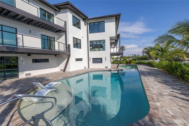 outdoor pool with a patio