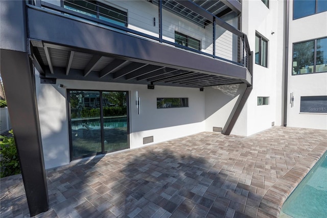 view of patio / terrace featuring visible vents