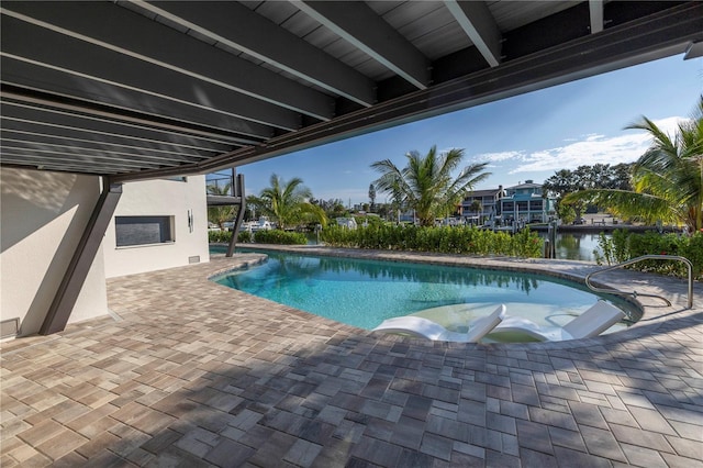 pool with a patio