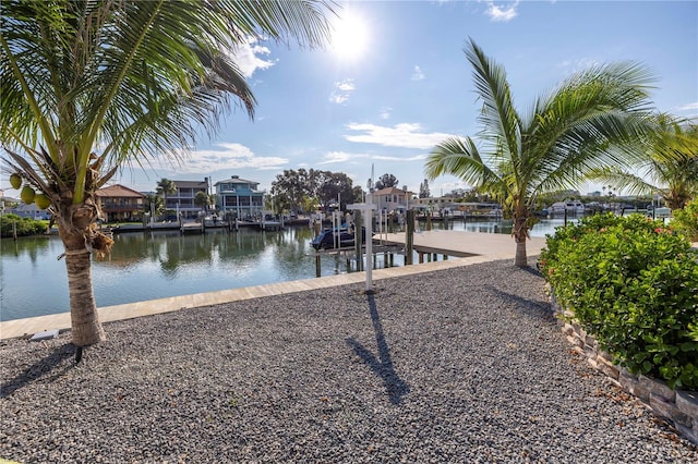 view of dock featuring a water view and boat lift