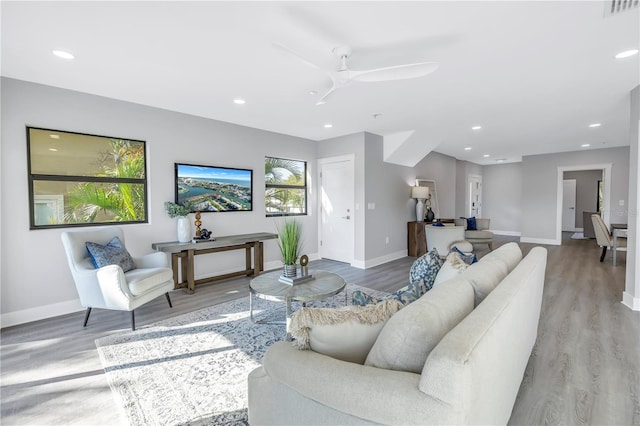 living room featuring wood finished floors and recessed lighting