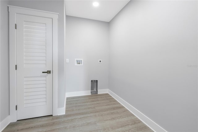 washroom featuring laundry area, washer hookup, wood finished floors, baseboards, and electric dryer hookup