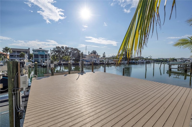 dock area with a water view