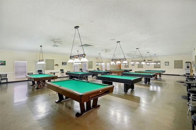 playroom featuring a textured ceiling and billiards