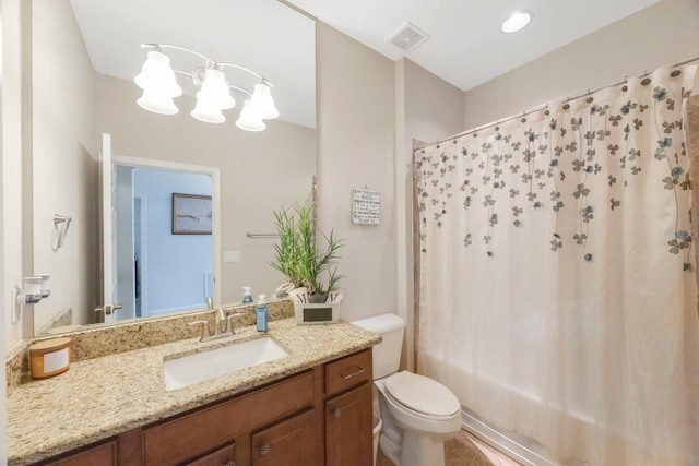 full bathroom featuring vanity, toilet, and shower / bath combo with shower curtain