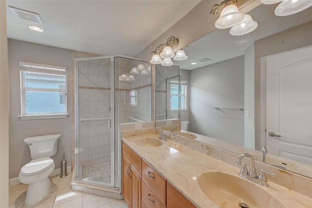 full bathroom with tile patterned flooring, visible vents, toilet, and a sink