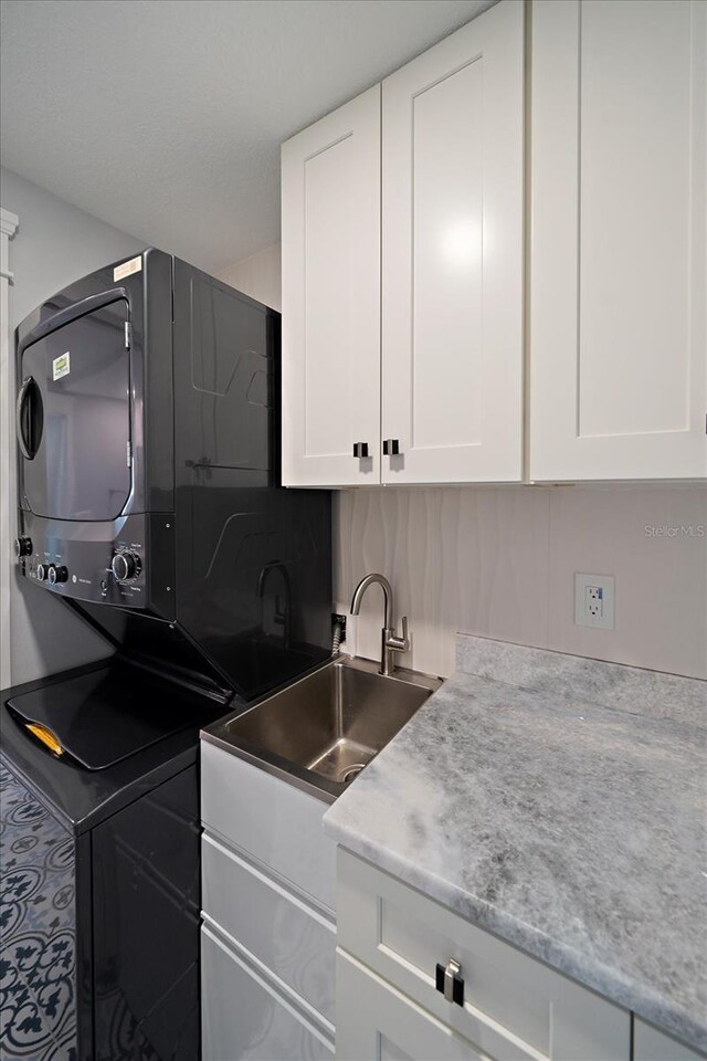 kitchen with sink and white cabinets