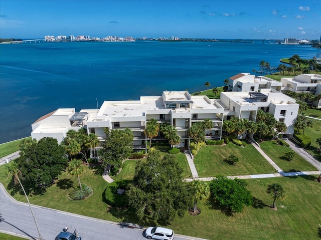 birds eye view of property featuring a water view