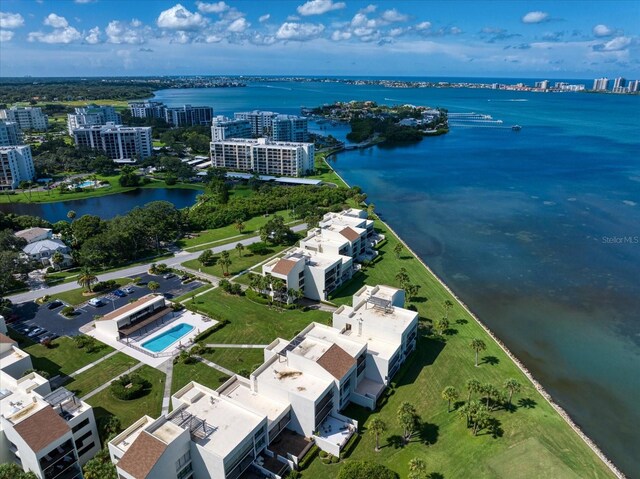 bird's eye view with a water view