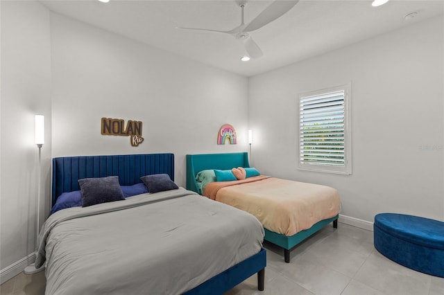 bedroom with light tile patterned flooring and ceiling fan