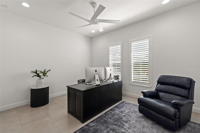 tiled office space featuring ceiling fan