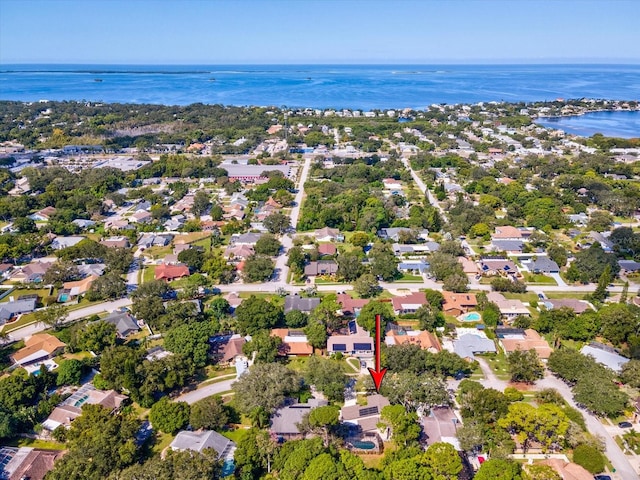 bird's eye view with a water view