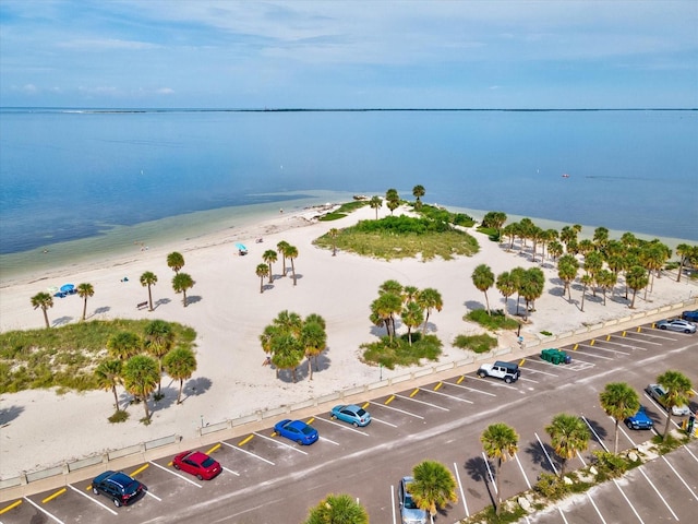 aerial view with a beach view and a water view