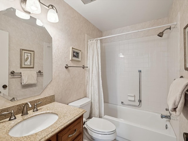 full bathroom with vanity, toilet, and shower / bath combo