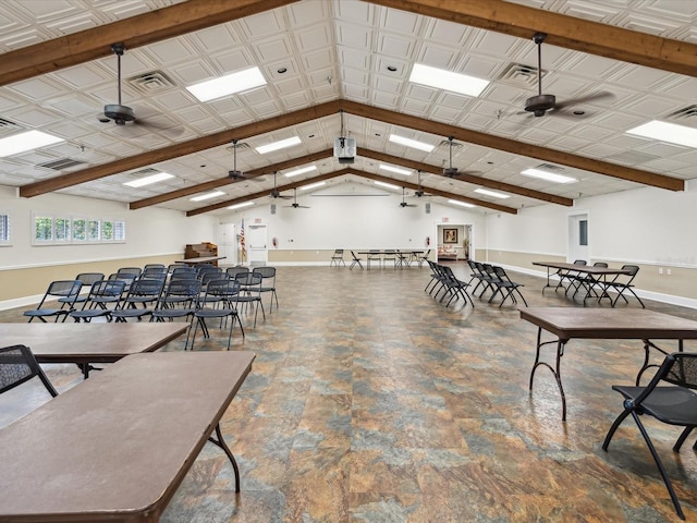 dining room with ceiling fan, beamed ceiling, and high vaulted ceiling