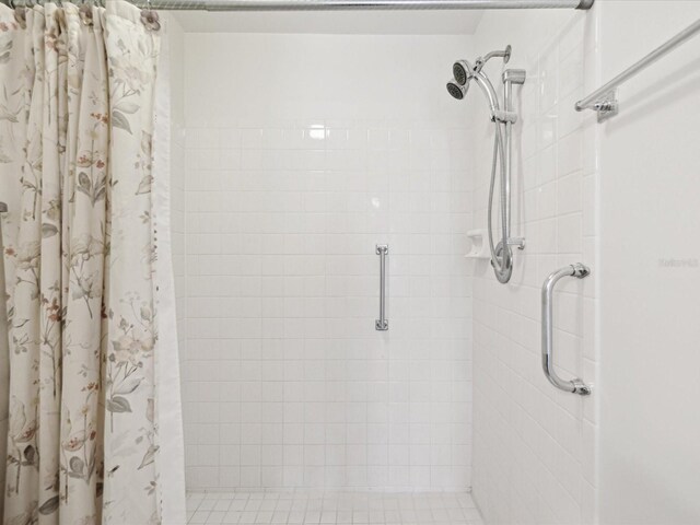 bathroom featuring a shower with curtain