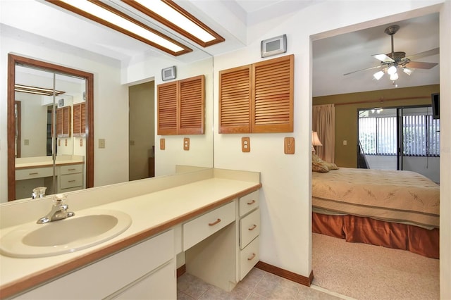 bathroom featuring vanity, ceiling fan, and tile patterned floors