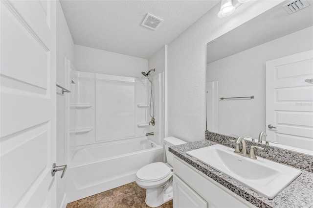 full bathroom featuring vanity, a textured ceiling, bathing tub / shower combination, tile patterned floors, and toilet