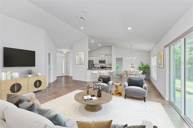 tiled living room with a chandelier and high vaulted ceiling