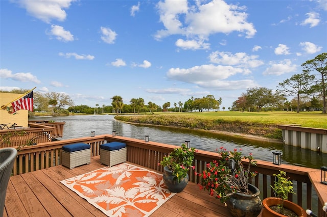 deck featuring a water view