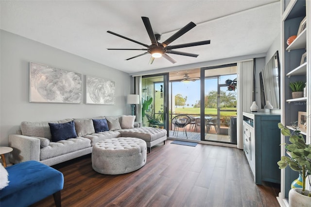 living room with ceiling fan, expansive windows, and dark hardwood / wood-style flooring