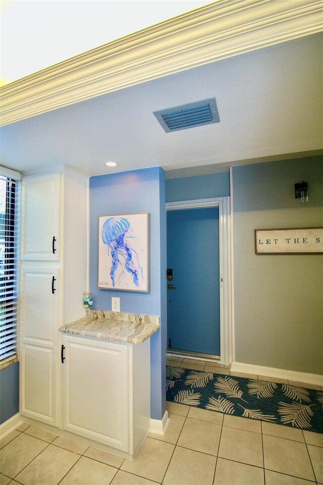 bathroom with tile patterned flooring