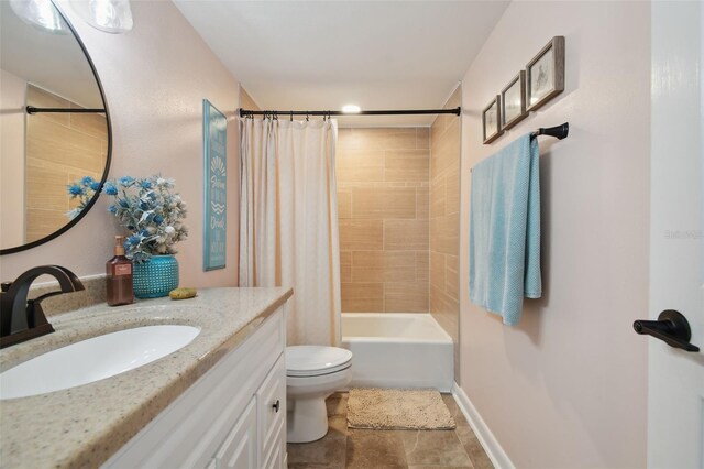 full bathroom with vanity, toilet, and shower / bath combo